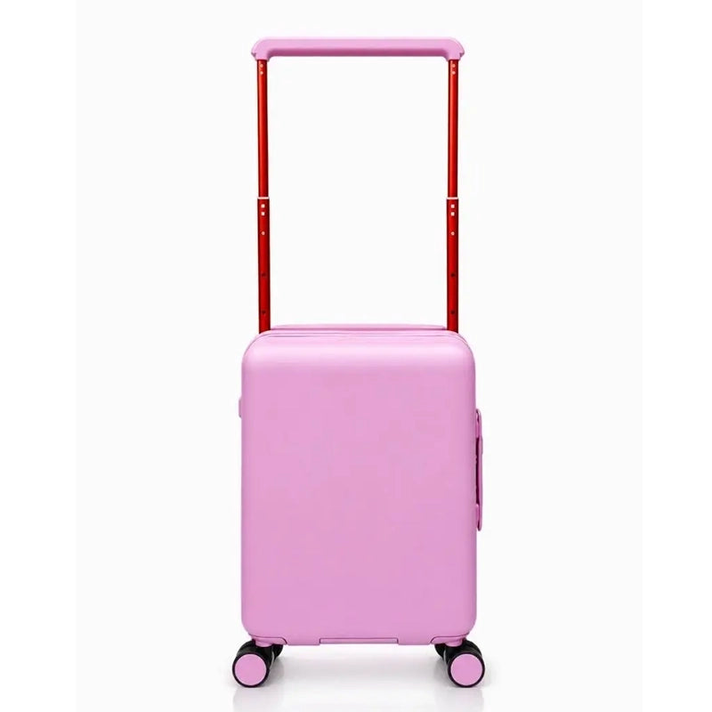 Gros plan sur les roues pivotantes doubles d'une valise rigide