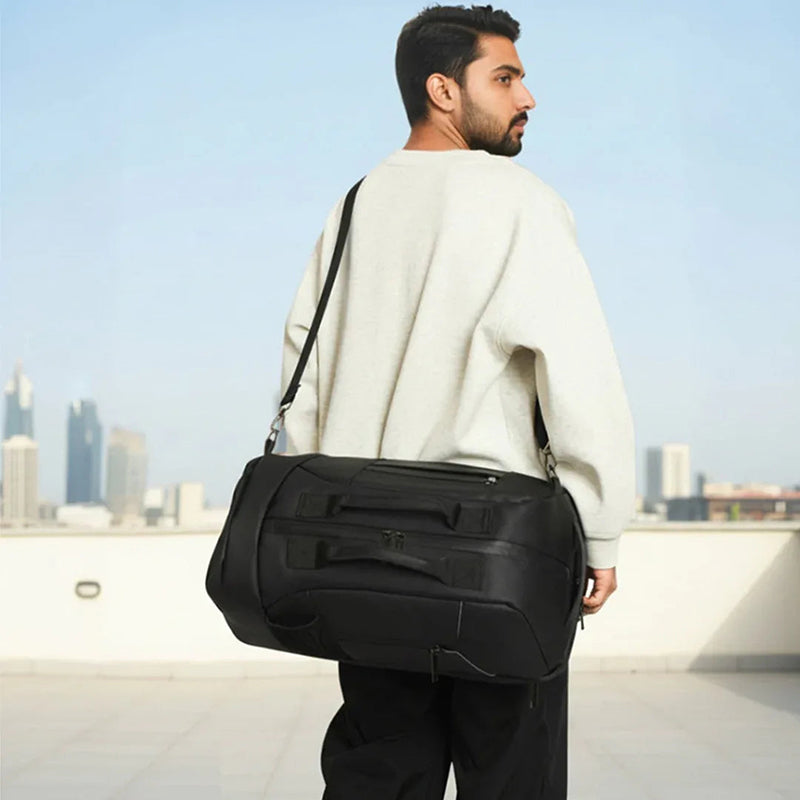 Compartiment chaussures séparé du sac à dos pour garder les vêtements propres
