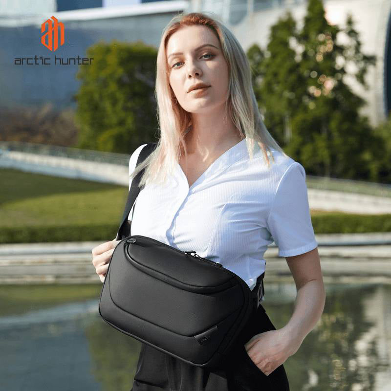 Sac bandoulière crossbody imperméable anti-vol coloris gris, unisexe, idéal voyage et quotidien
