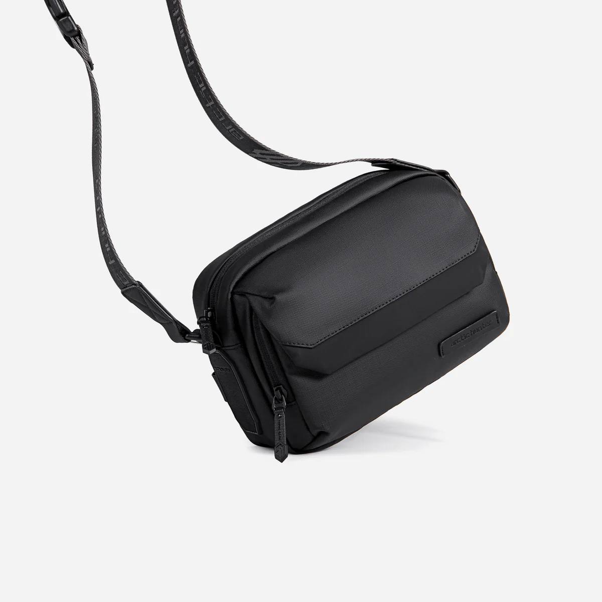 Sac bandoulière homme noir, idéal pour voyage et usage quotidien