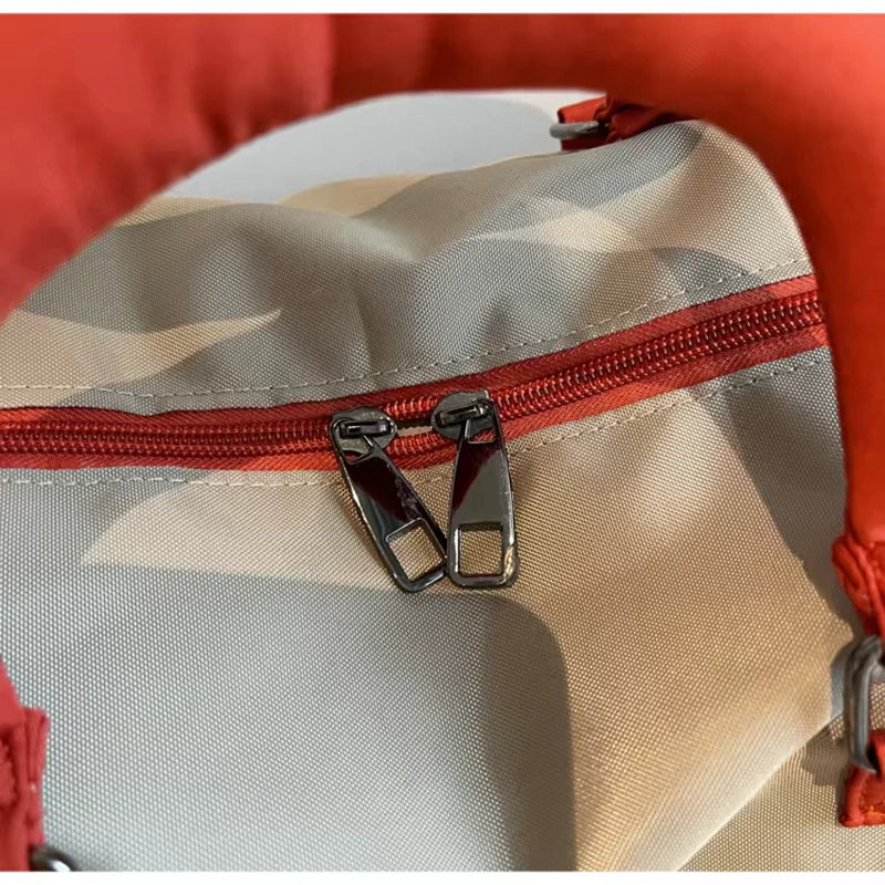 Compartiment séparé du sac de sport dédié au rangement des chaussures