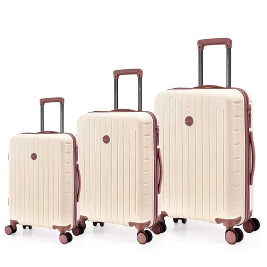 Set de 3 valises rigides en PP coloris rose poudré avec roues 360°