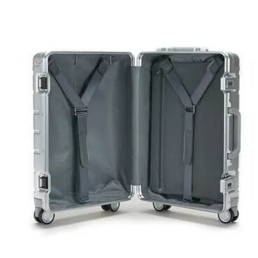 Intérieur spacieux de la valise de cabine en aluminium avec sangles de fixation