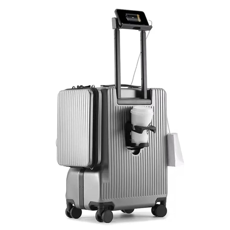 Valise cabine rigide ouverte montrant l'intérieur spacieux avec sangles de maintien et pochette avant