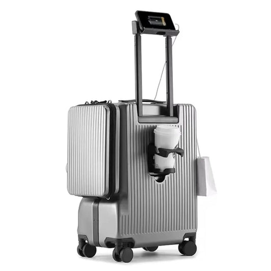 Valise cabine rigide ouverte montrant l'intérieur spacieux avec sangles de maintien et pochette avant